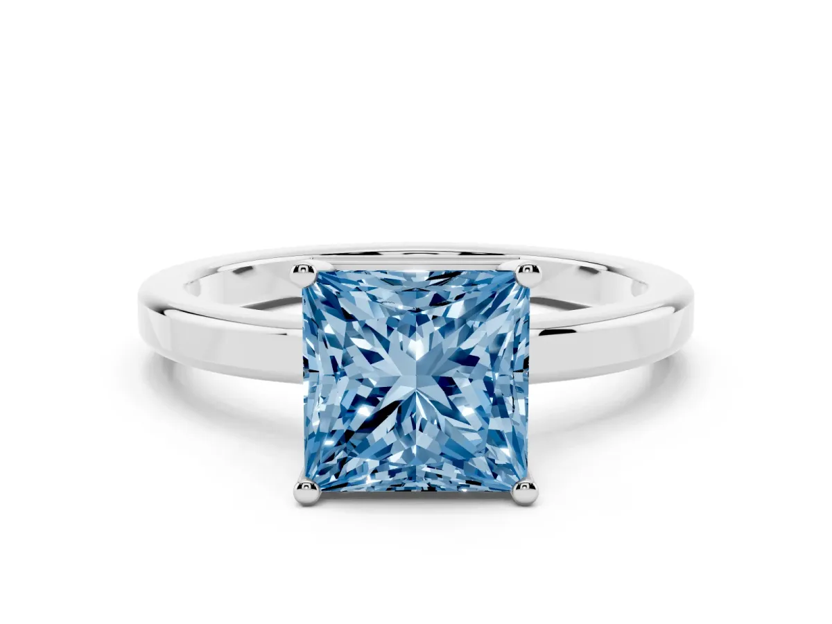 Fancy Blue Princess Cut Cut Solitaire Engagement Ring with Four-Prong Setting on a Classic Band Silver