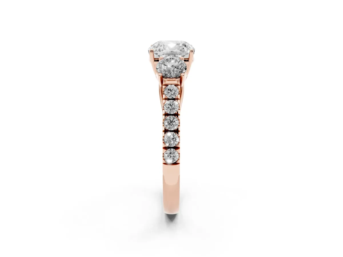 Cushion Cut Cut Diamond Three-Stone Ring with Round Side Stones and Pavé Band Rose gold