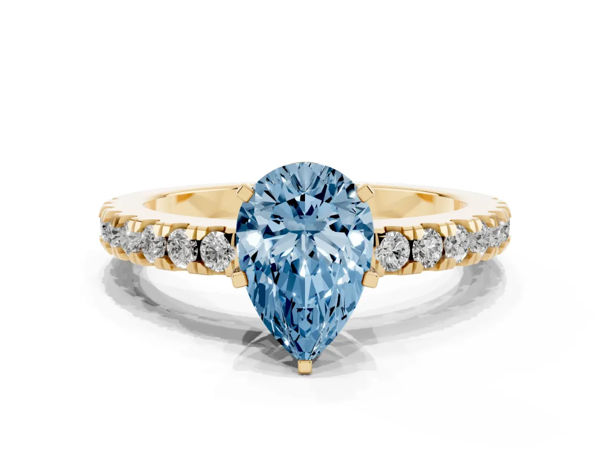 Fancy Blue Pear Cut Solitaire Diamond with Pavé Band and Four-Prong Setting Yellow gold