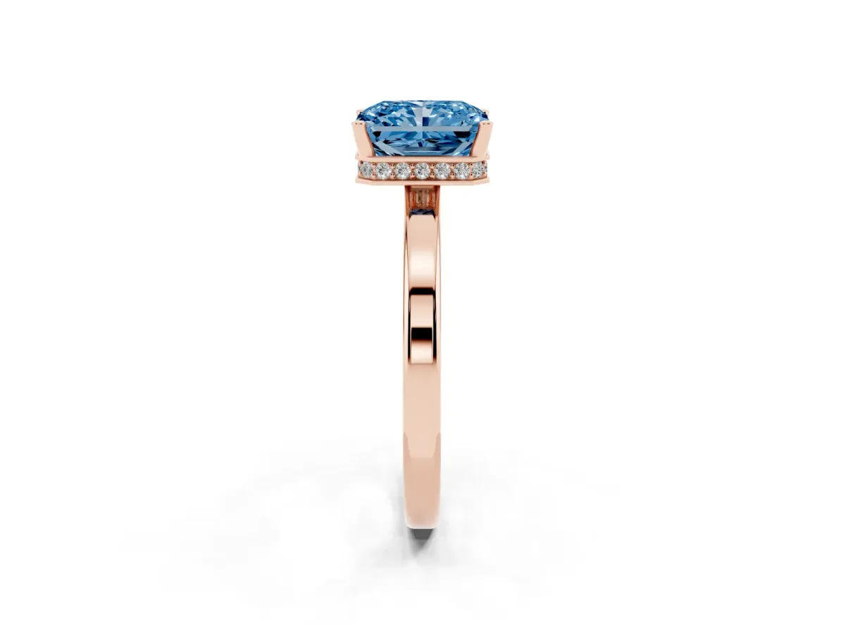 Fancy Blue Radiant Cut Cut Solitaire Engagement Ring with Four-Prong Setting on a Classic Band Rose gold