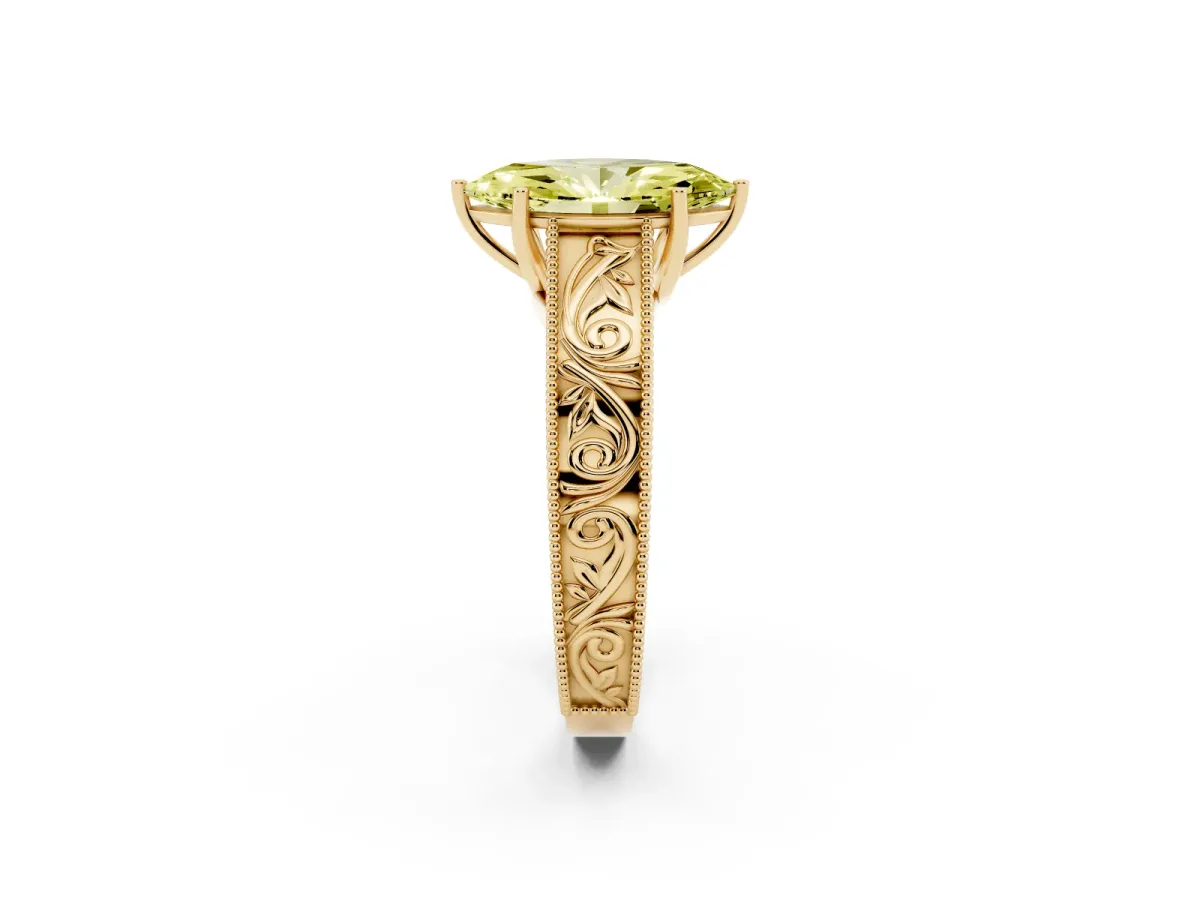 Fancy Yellow Marquise Cut Diamond Solitaire Ring with Engraved Band and Four-Prong Setting Yellow gold