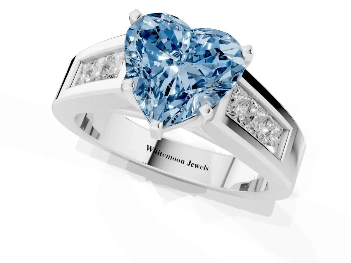 Fancy Blue Heart Cut Cut Channel Set Solitaire Ring with Four-Prong Setting Silver