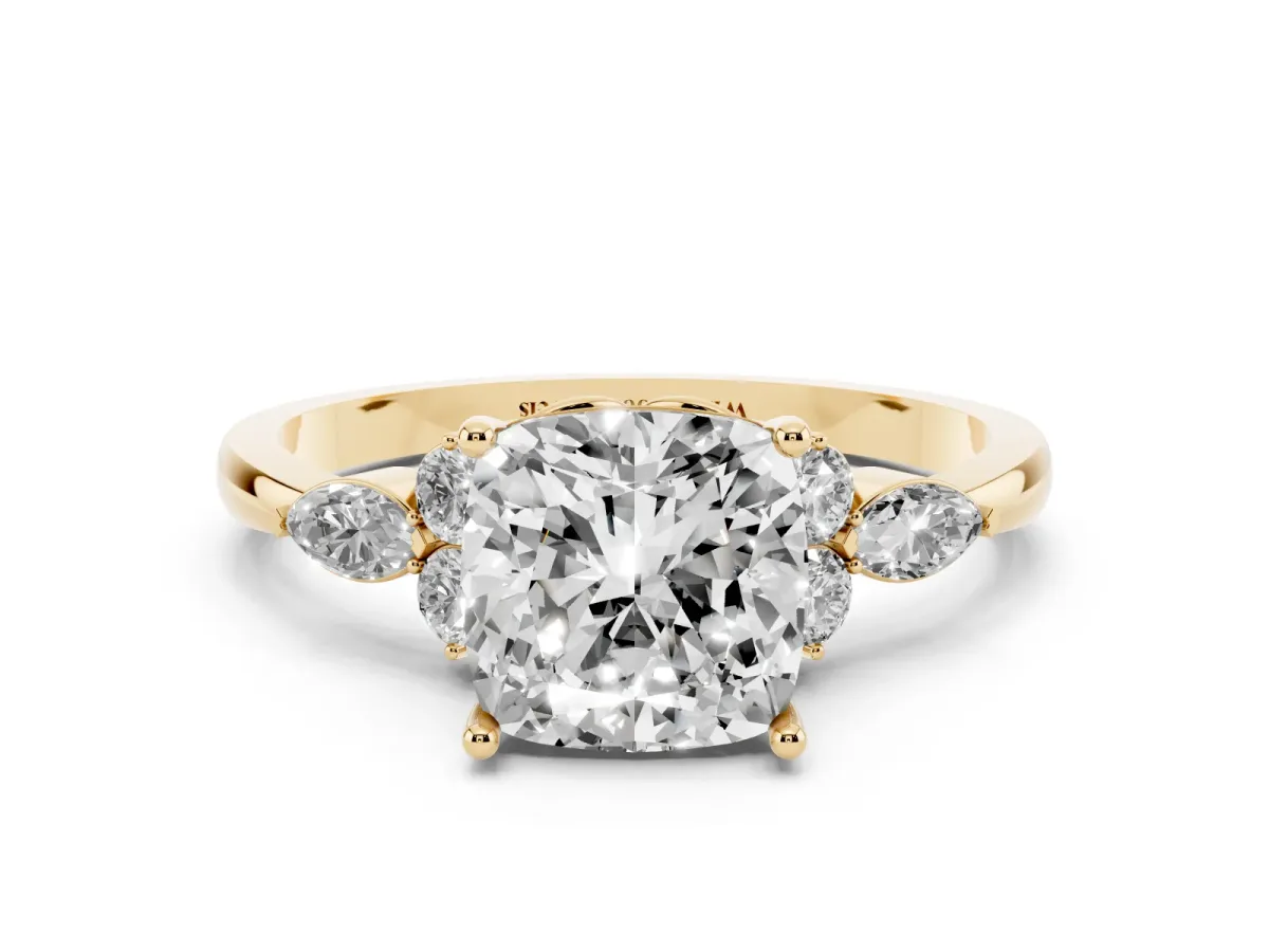 Cushion Cut Brilliant Diamond Solitaire Ring with Pear Side Stones and Four-Prong Setting Yellow gold