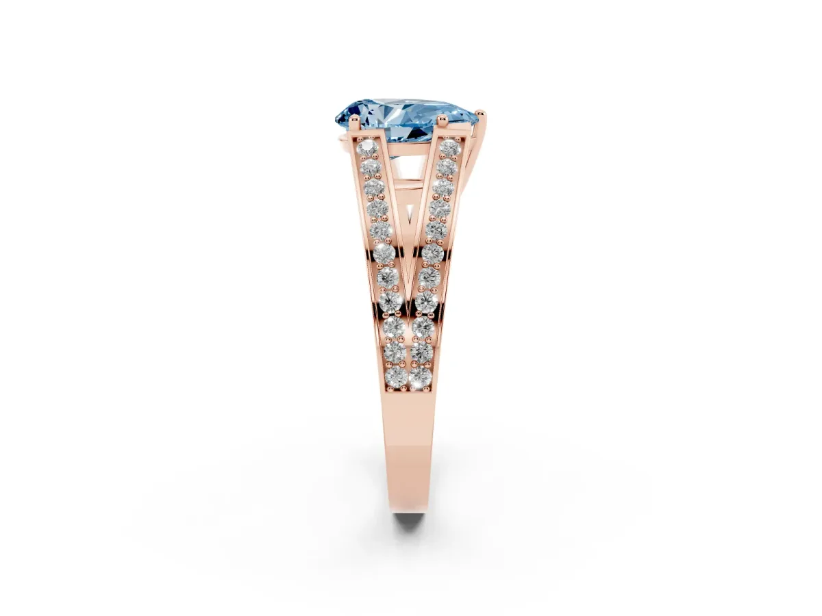 Fancy Blue Pear Cut Diamond Split Shank Ring with Pavé Band and Four-Prong Setting Rose gold