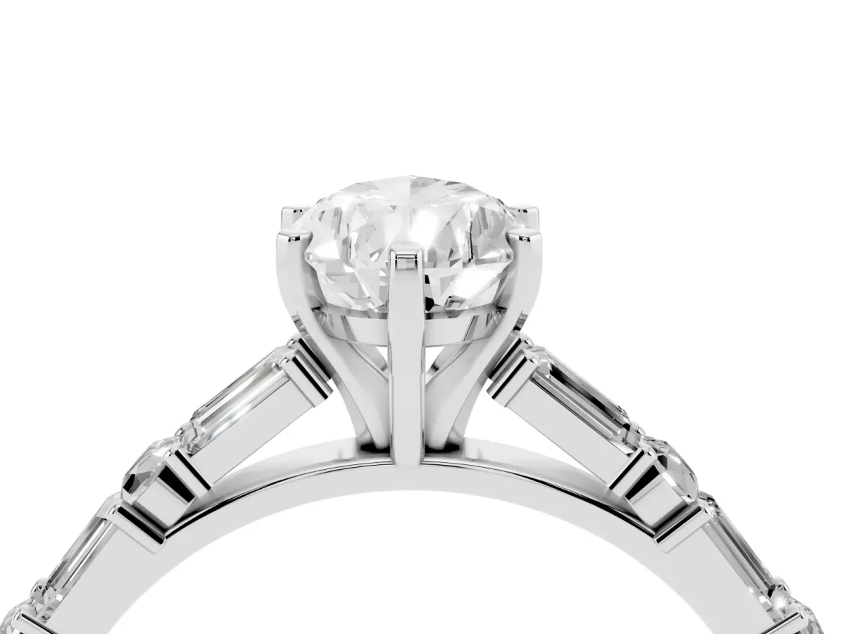 Pear Cut Diamond Solitaire with Side Baguettes and Channel Set Band Platinum