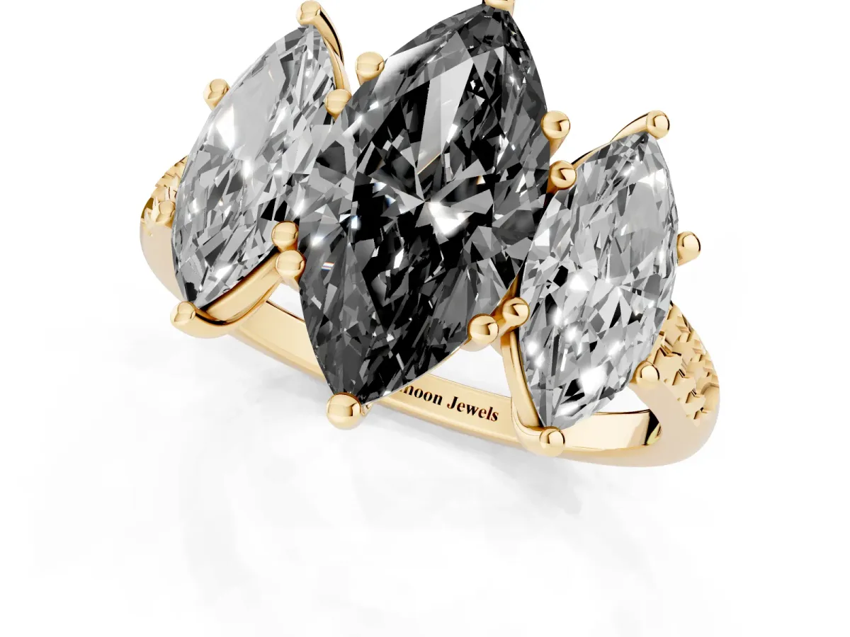 Fancy Black Three-Stone Marquise Cut Diamond Ring with Round Pavé Band and Prong Setting Yellow gold