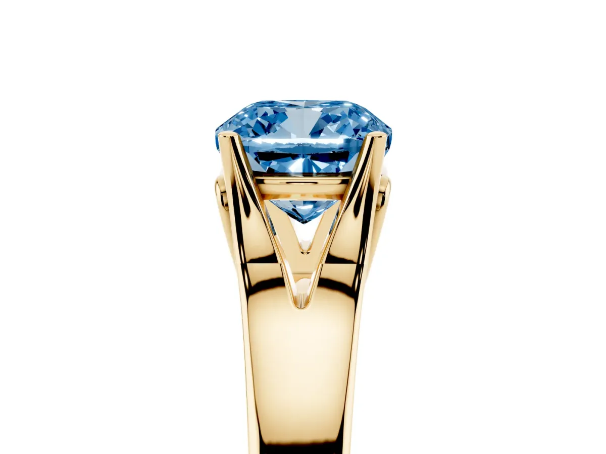 Fancy Blue Cushion Cut Solitaire Diamond Ring with Cathedral Band and Four-Prong Setting Yellow gold