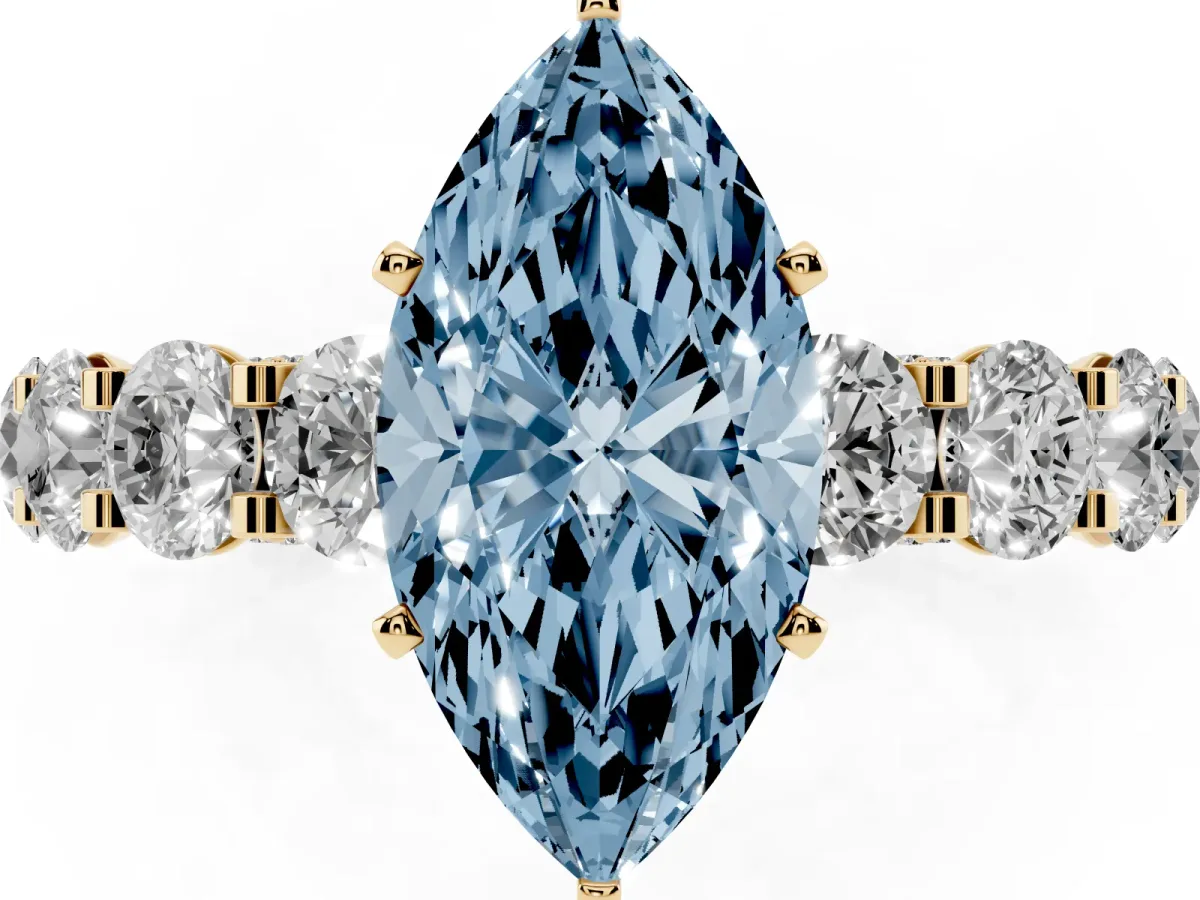 Fancy Blue Marquise Cut Diamond Side Stone Engagement Ring with Four-Prong Setting Yellow gold