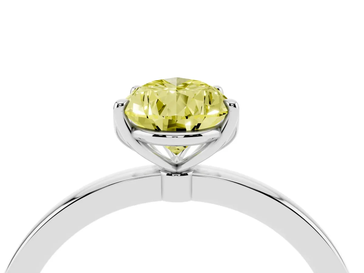 Fancy Yellow Pear Cut Diamond Solitaire Ring with Thin Band and Prong Setting Silver