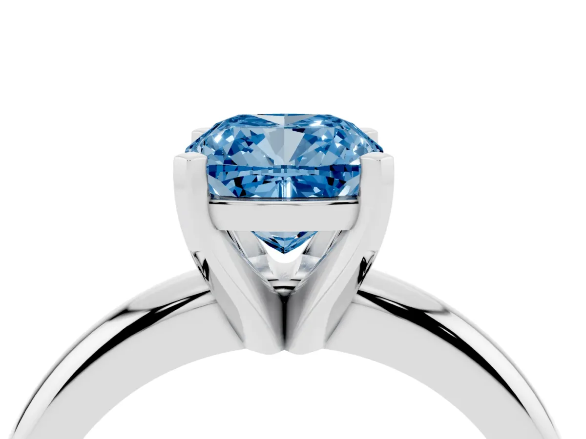 Fancy Blue Cushion Cut Diamond Solitaire Engagement Ring with Round Band and Four-Prong Setting Platinum