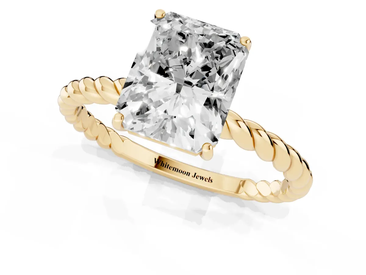 Radiant Cut Solitaire Twist Band Ring with Four-Prong Setting Yellow gold