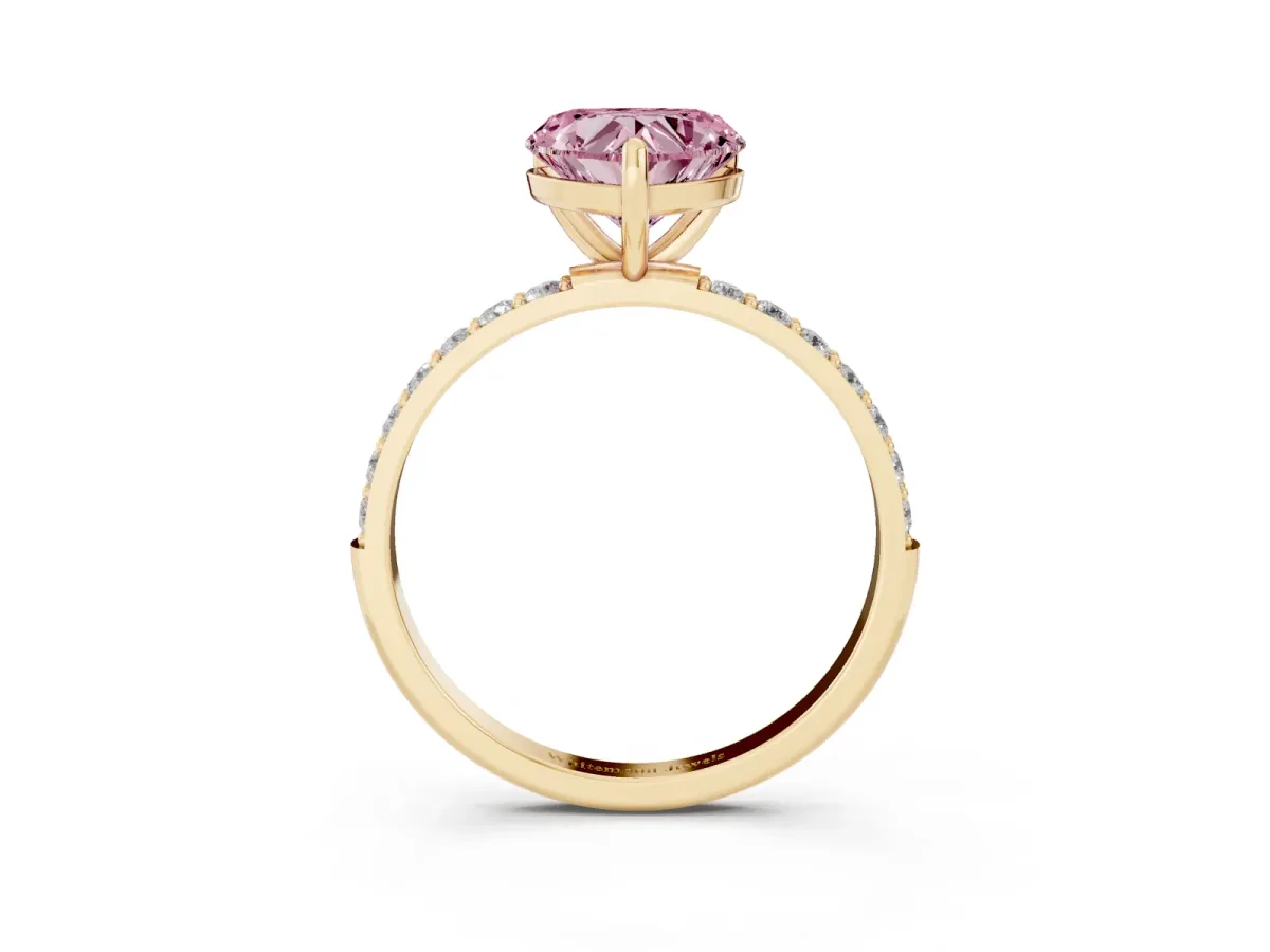 Fancy Pink Heart Cut Diamond Solitaire Ring with Round Pavé Band and Prong Setting Yellow gold