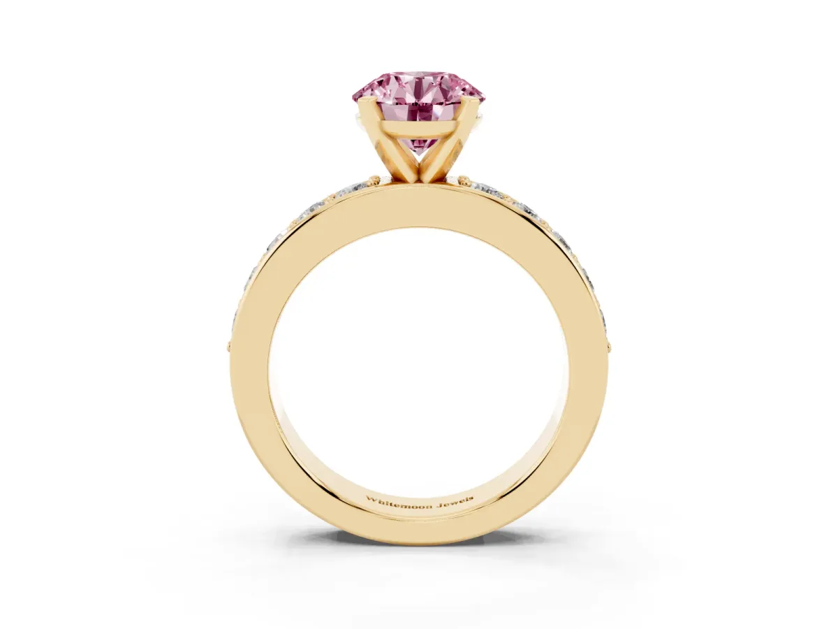 Fancy Pink Round Cut Diamond Engagement Ring with Channel Set Round Band and Prong Setting Yellow gold
