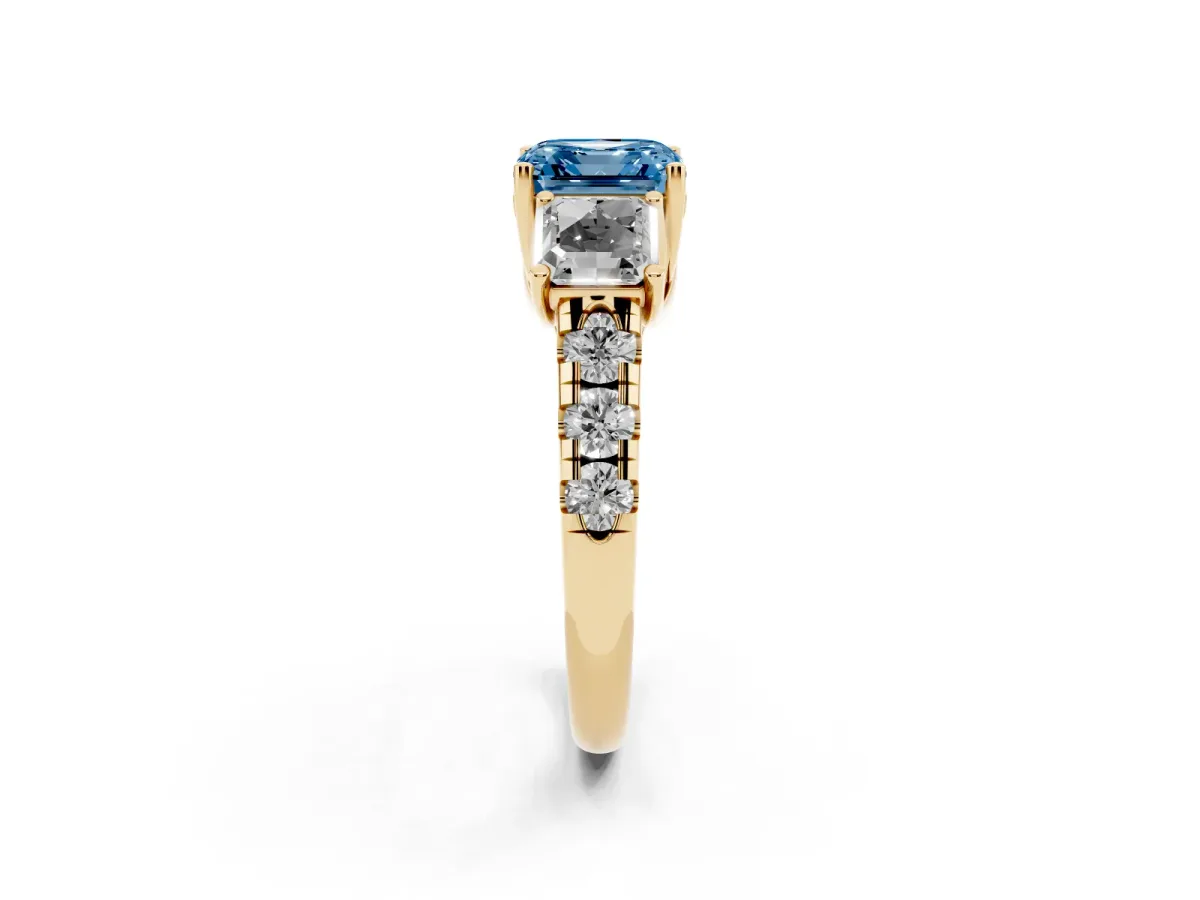 Fancy Blue Three-Stone Asscher Cut Diamond Pavé Band with Prong Setting Yellow gold