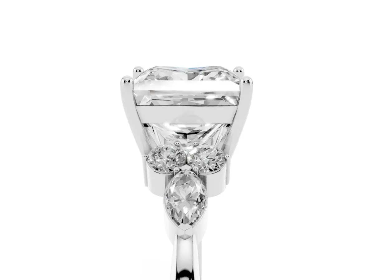 Princess Cut Brilliant Diamond Solitaire Ring with Pear Side Stones and Four-Prong Setting Silver