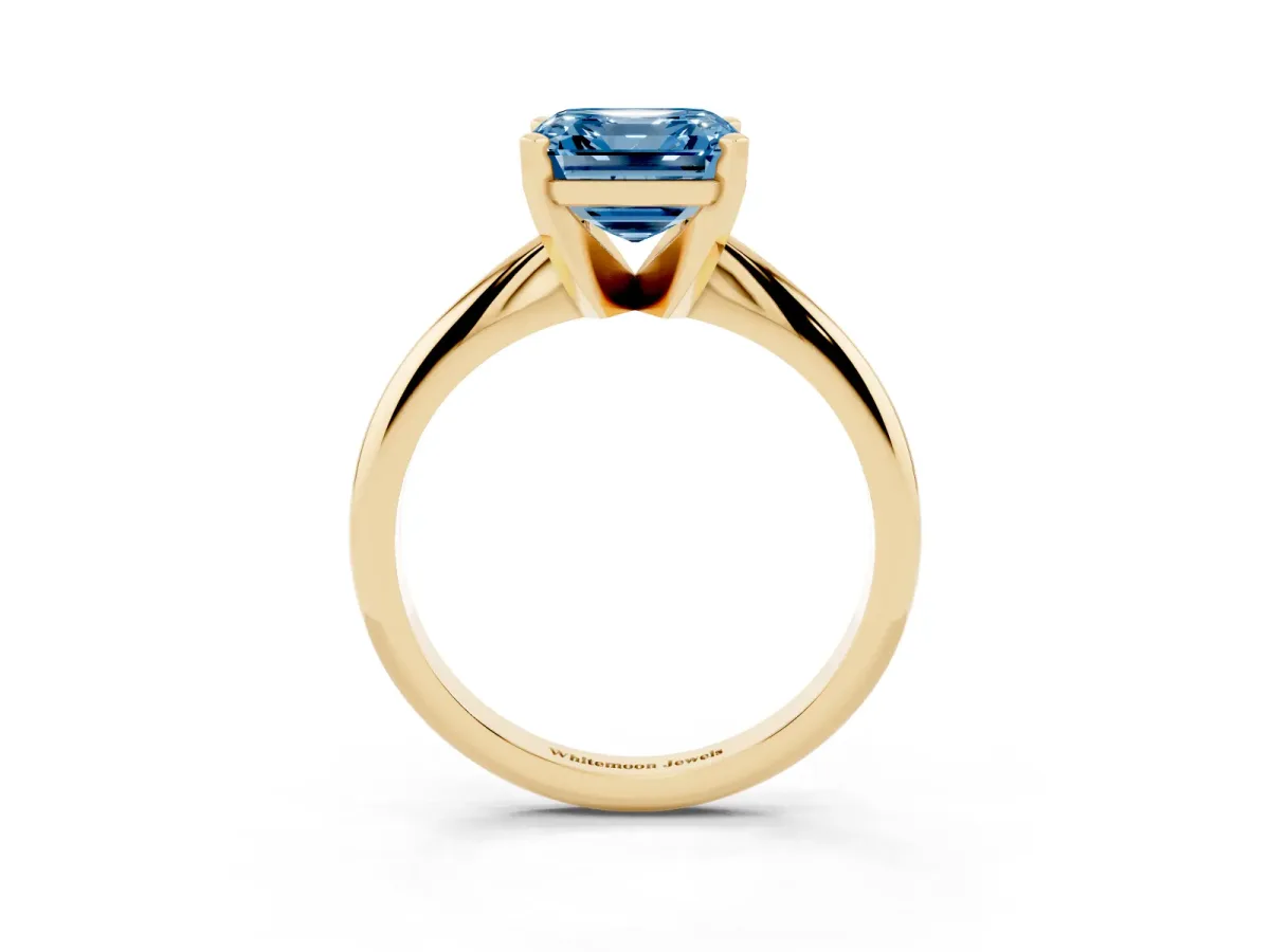Fancy Blue Asscher Cut Cut Solitaire Ring with Four-Prong Setting on a Classic Band Yellow gold