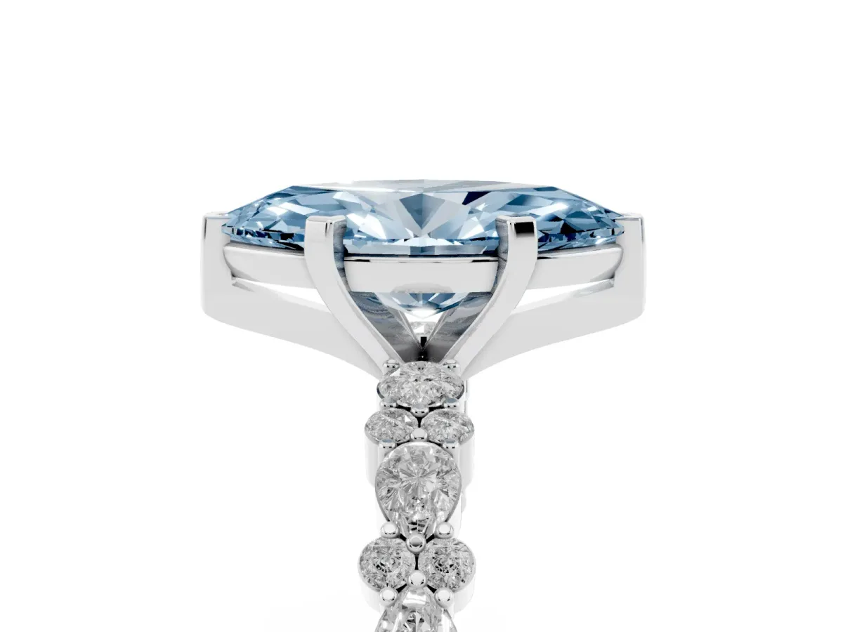 Fancy Blue Marquise Cut Diamond Side Stone Solitaire Ring with Round and Four-Prong Setting Silver
