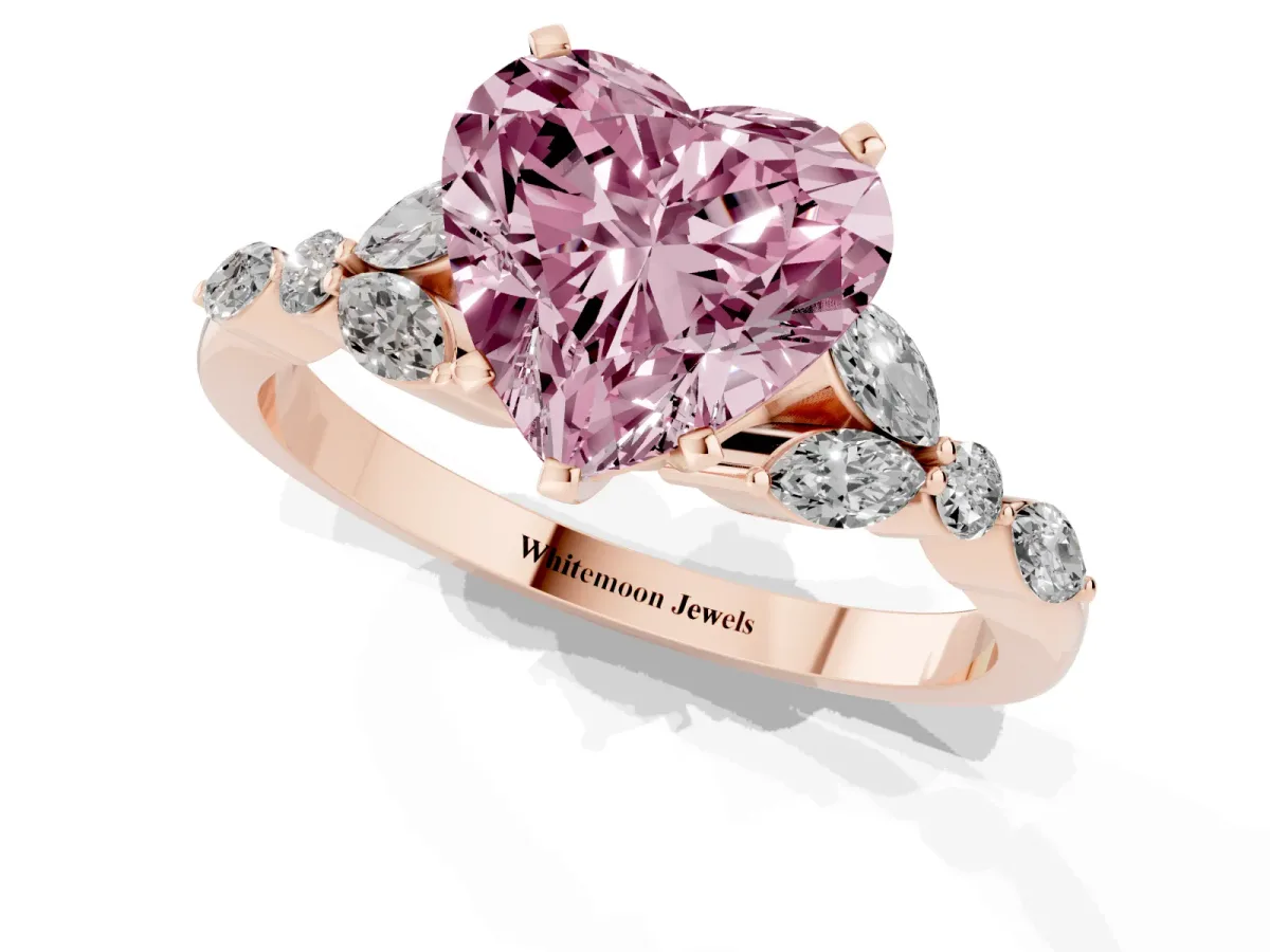 Fancy Pink Heart Cut Diamond Solitaire Ring with Side Stones and Four-Prong Setting Rose gold