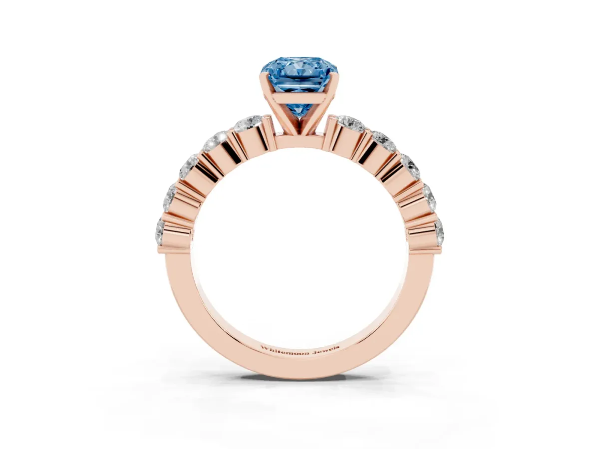 Fancy Blue Radiant Cut Diamond Solitaire Ring with Shared Prong Round Side Stones Rose gold