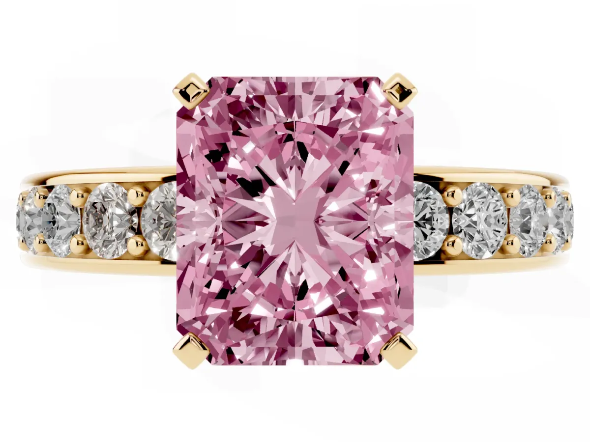 Fancy Pink Radiant Cut Diamond Engagement Ring with Channel Set Round Band and Prong Setting Yellow gold