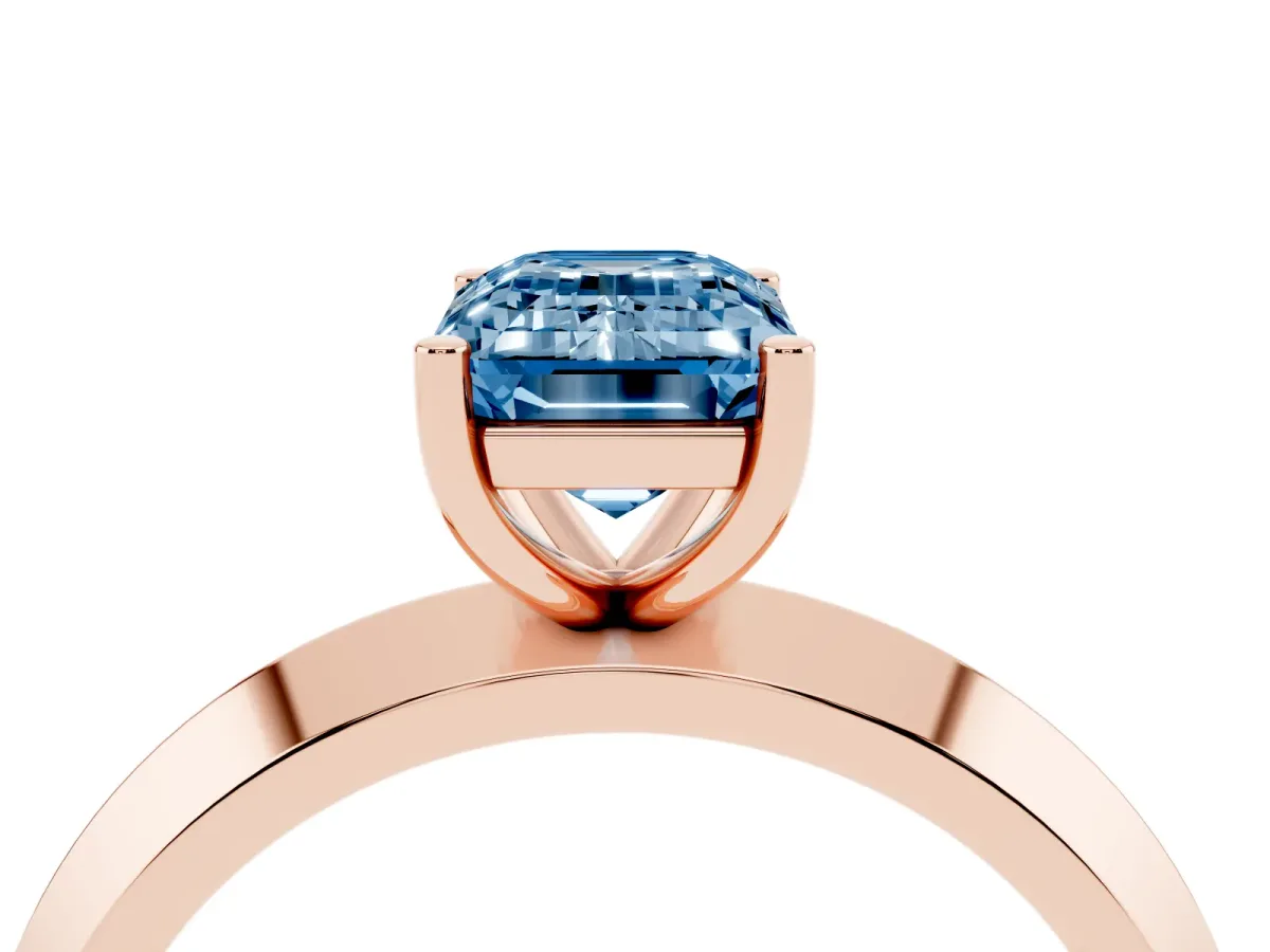 Fancy Blue Emerald Cut Cut Solitaire Engagement Ring with Flat Band and Four-Prong Setting Rose gold