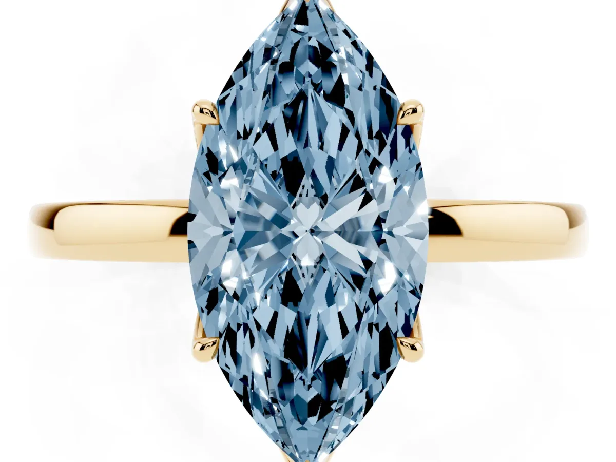 Fancy Blue Marquise Cut Diamond Solitaire Ring with Thin Band and Prong Setting Yellow gold