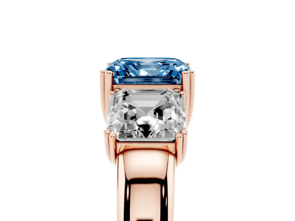 Fancy Blue Three-Stone Asscher Cut Cut Diamond Ring with Channel Set Band and Four-Prong Setting Rose gold