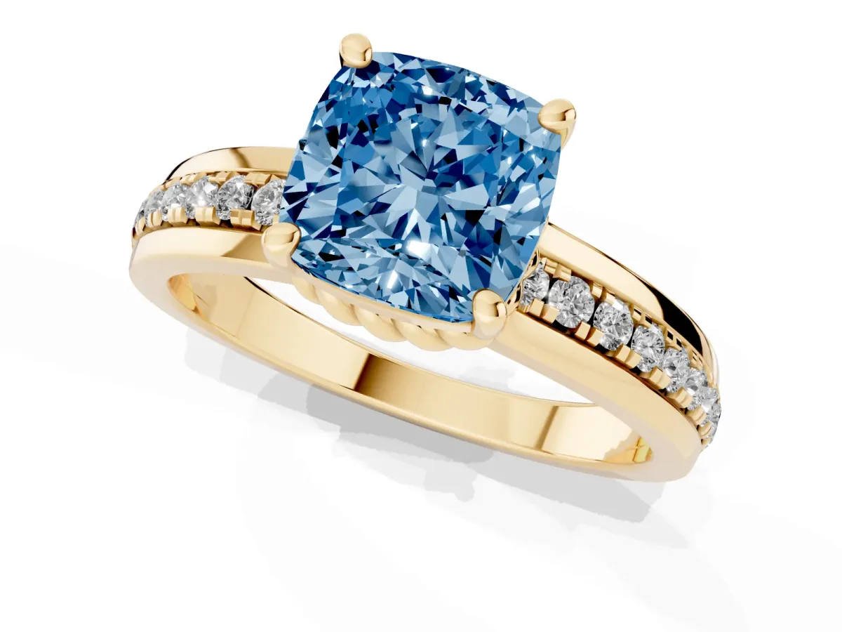 Fancy Blue Cushion Cut Solitaire Diamond Ring with Channel Set Band and Six-Prong Setting Yellow gold