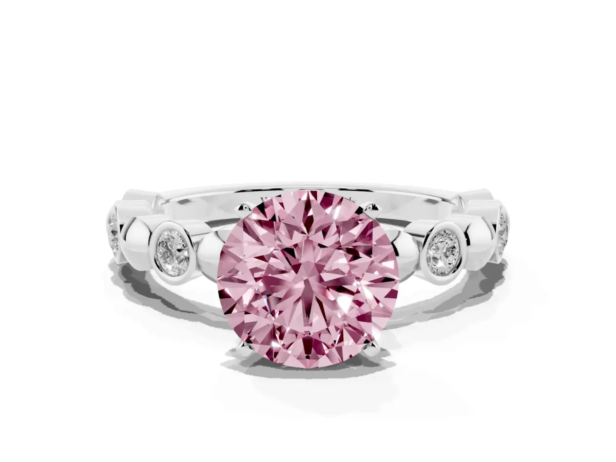 Fancy Pink Round Cut Solitaire Bezel-Set Diamond Ring with Beaded Band and Four-Prong Setting Silver