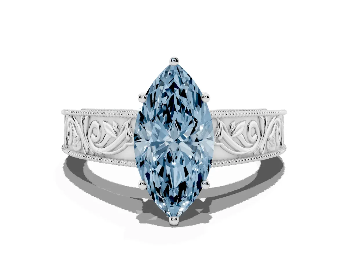 Fancy Blue Marquise Cut Diamond Solitaire Ring with Engraved Band and Four-Prong Setting White gold