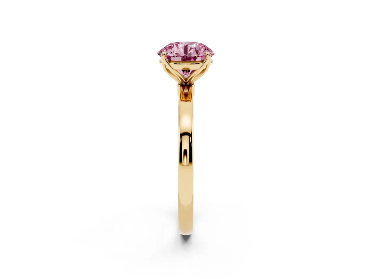 Fancy Pink Round Cut Diamond Solitaire Ring with Thin Band and Prong Setting Yellow gold
