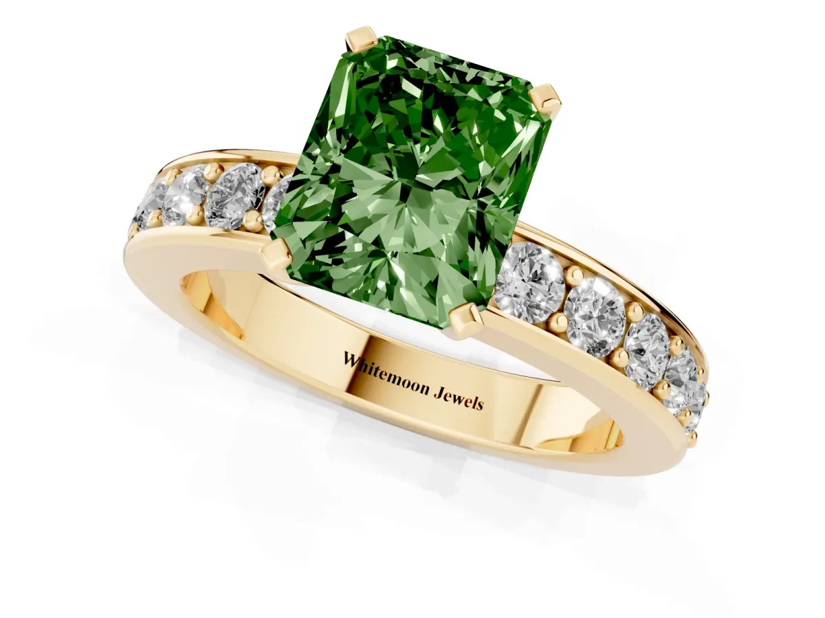 Fancy Green Radiant Cut Diamond Engagement Ring with Channel Set Round Band and Prong Setting Yellow gold