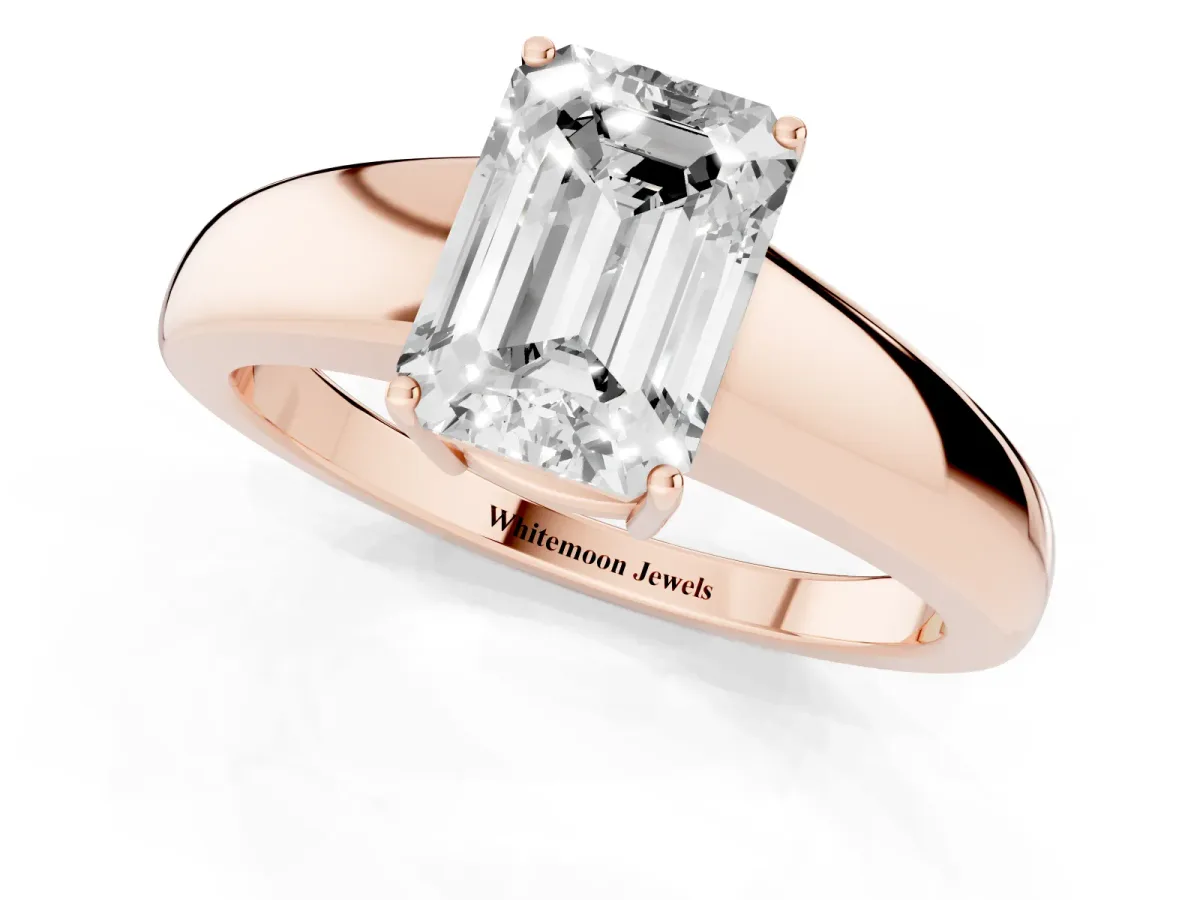 Emerald Cut Solitaire Diamond Ring with Tapered Band and Four-Prong Setting Rose gold