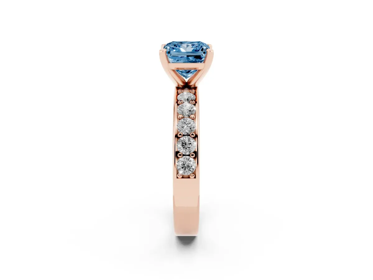 Fancy Blue Princess Cut Diamond Engagement Ring with Channel Set Round Band and Prong Setting Rose gold