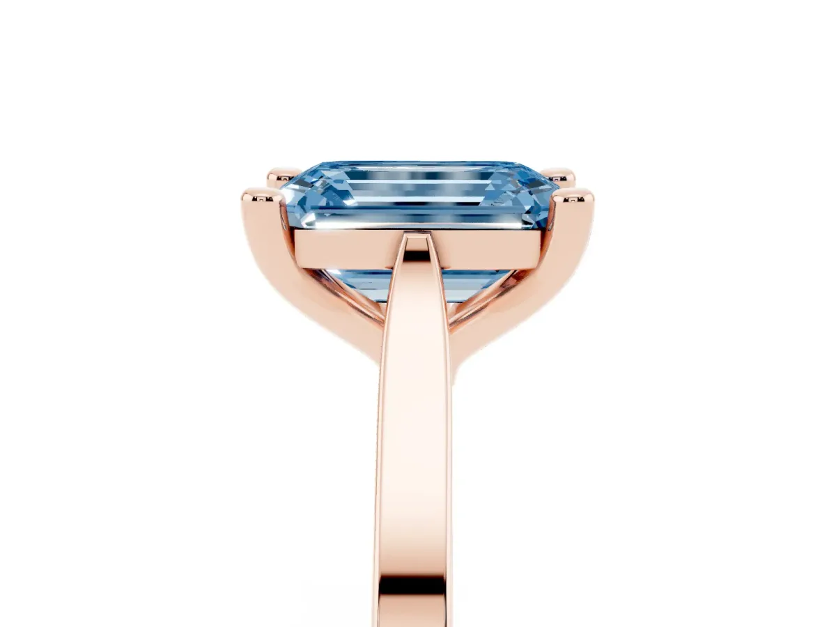 Fancy Blue Emerald Cut Solitaire Diamond Ring with Four-Prong Setting and Tapered Band Rose gold