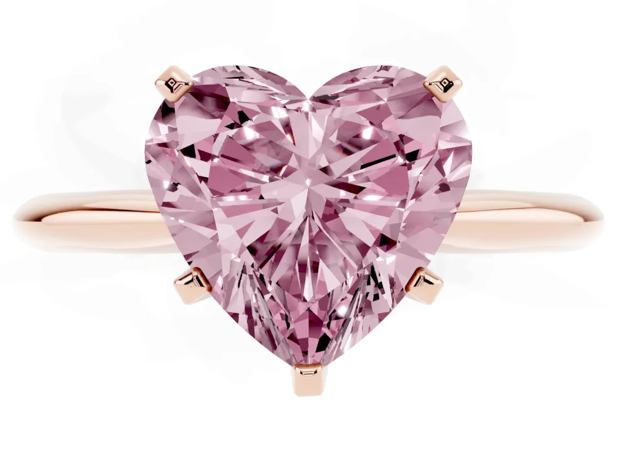 Fancy Pink Heart Cut Cut Solitaire Ring with Four-Prong Setting on a Classic Band Rose gold