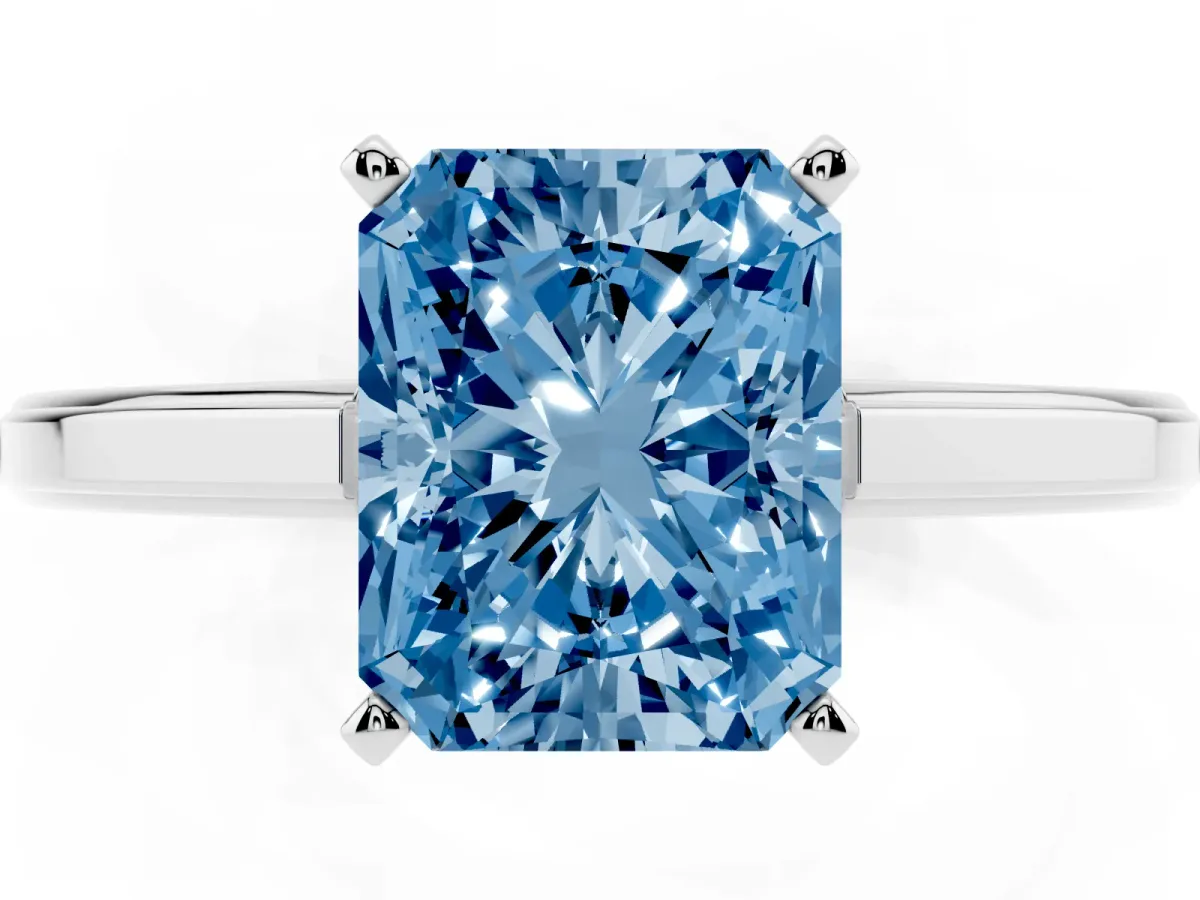 Fancy Blue Radiant Cut Solitaire Diamond Ring with Four-Prong Setting and Classic Band Platinum