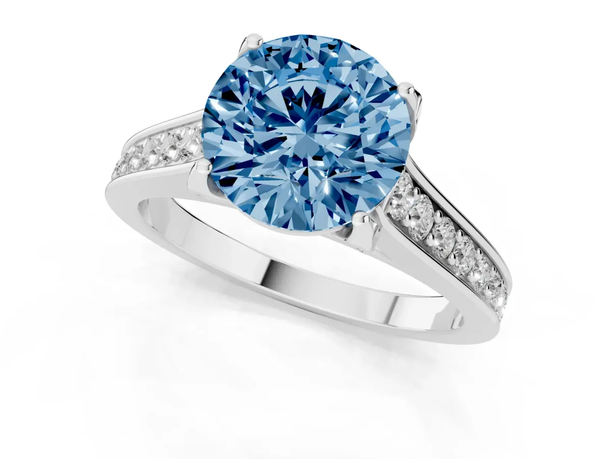 Fancy Blue Round Cut Brilliant Cut Diamond Engagement Ring with Pavé Band and Four-Prong Setting White gold