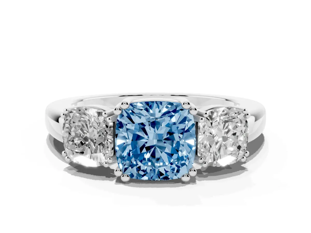Fancy Blue Three-Stone Cushion Cut Cut Diamond Ring with Channel Set Band and Four-Prong Setting Platinum