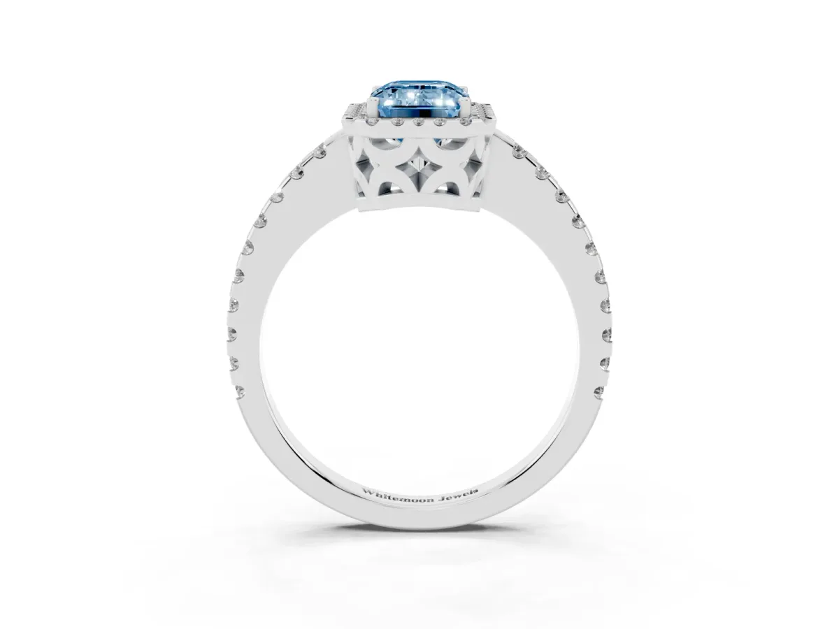 Fancy Blue Emerald Cut Diamond Halo Engagement Ring with Pavé Band and Prong Setting White gold