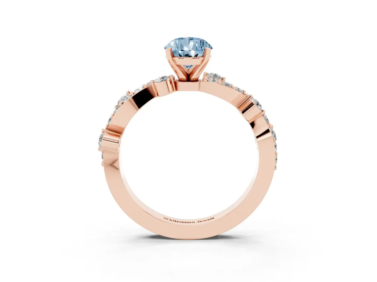 Fancy Blue Pear Cut Cut Solitaire Diamond Twisted Band with Pave Setting Rose gold