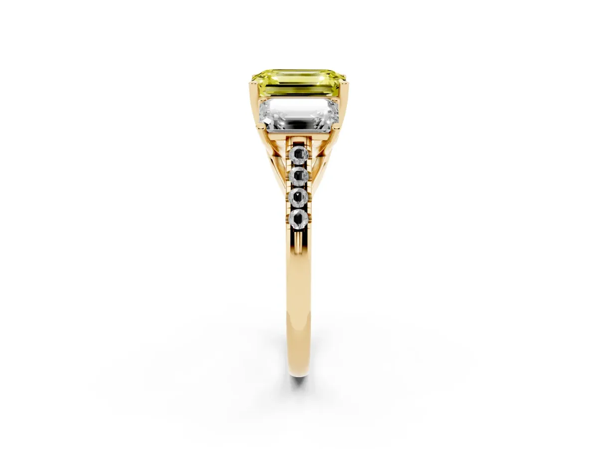 Fancy Yellow Three-Stone Emerald Cut Diamond Ring with Round Pavé Band and Prong Setting Yellow gold