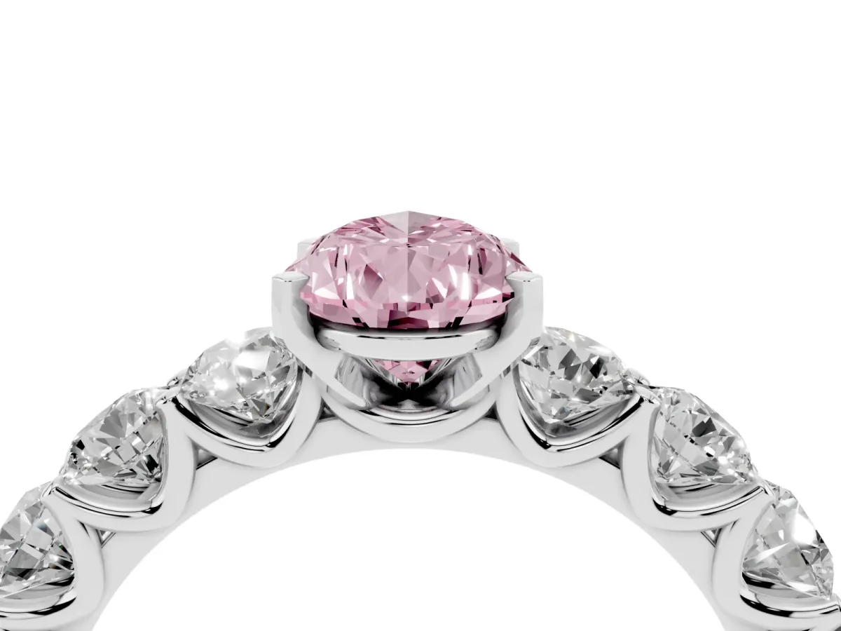 Fancy Pink Pear Cut Diamond Prong Setting with Side Stones on a Pave Band Silver