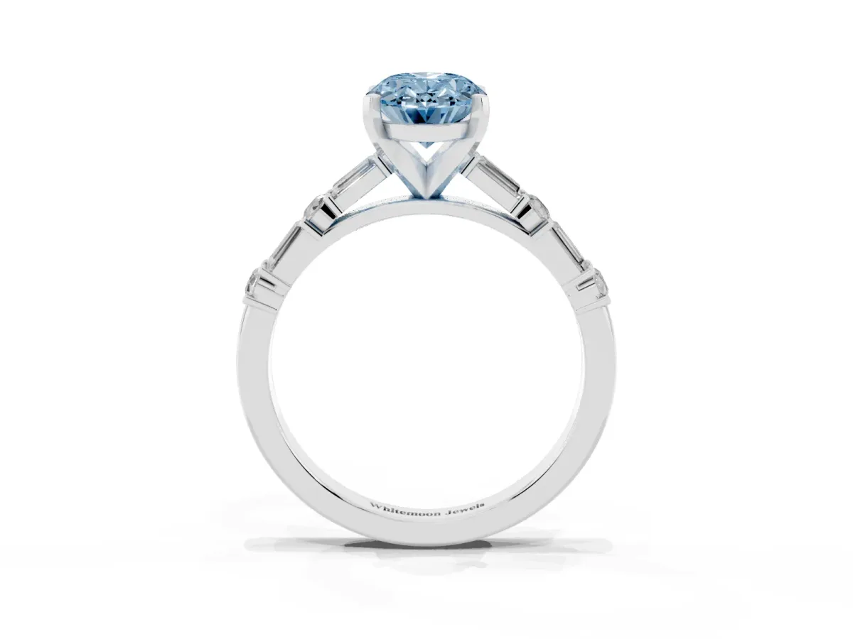 Fancy Blue Oval Cut Diamond Solitaire with Side Baguettes and Channel Set Band Silver