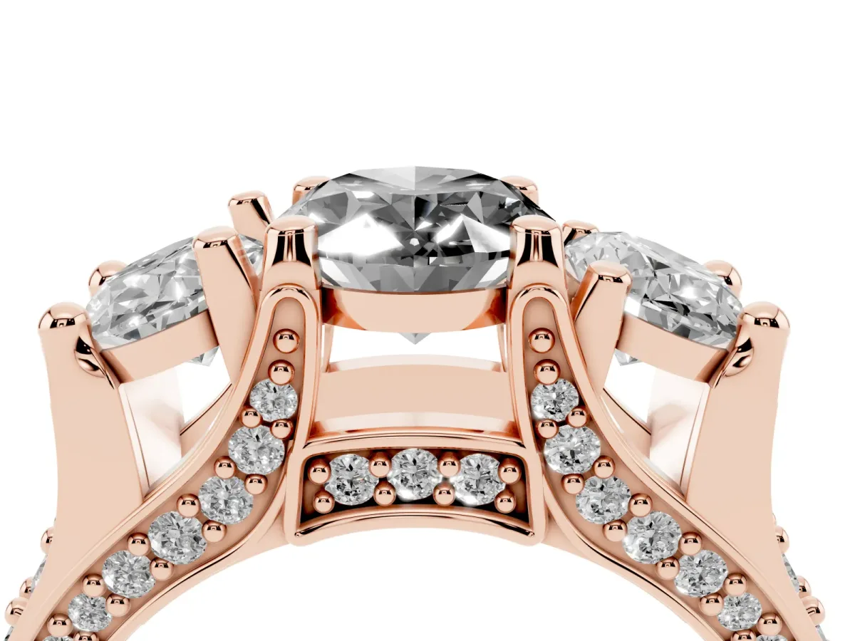 Fancy Black Oval Cut Diamond Three-Stone Ring with Channel Set Band and Four-Prong Setting Rose gold
