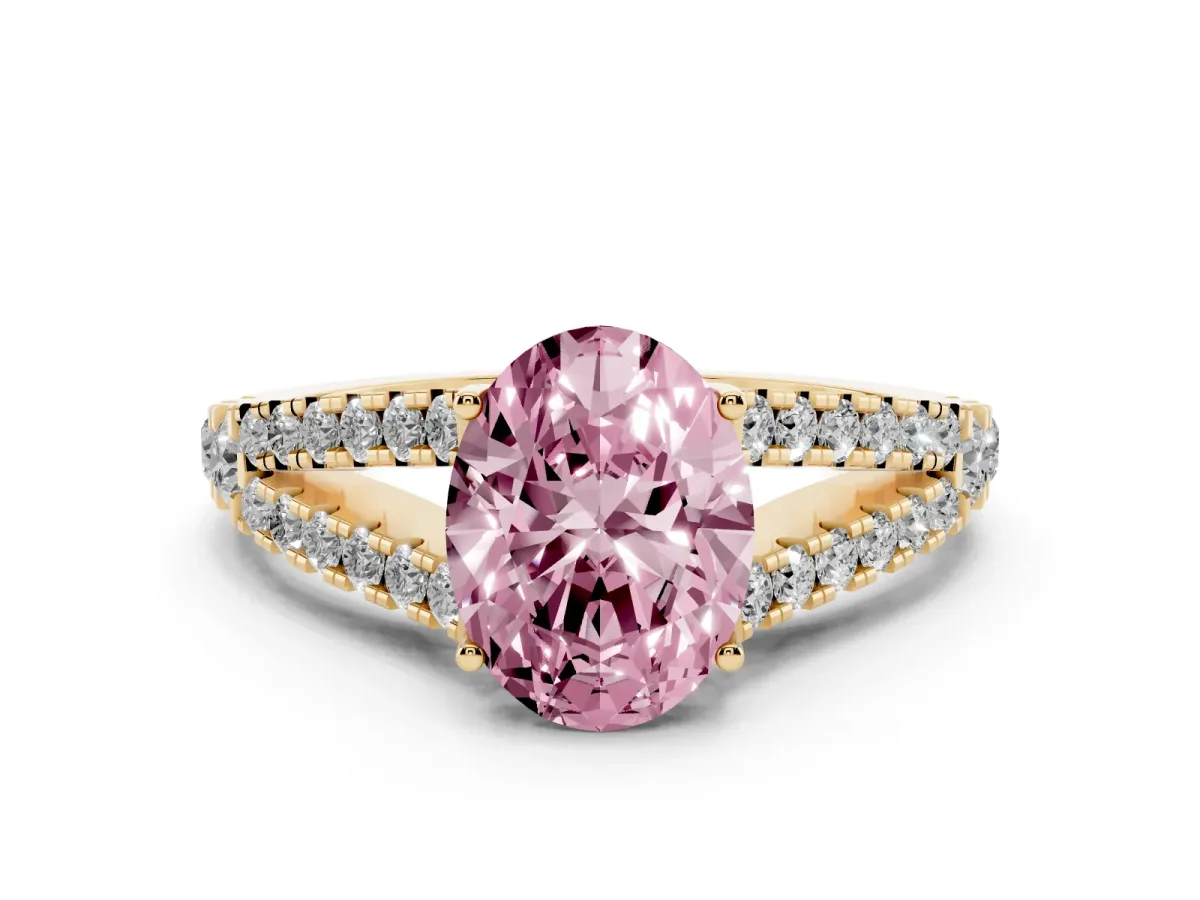Fancy Pink Oval Cut Diamond Split Shank Pavé Engagement Ring with Four-Prong Setting Yellow gold