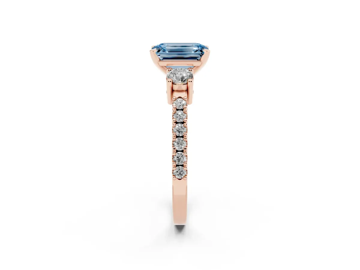 Fancy Blue Emerald Cut Three-Stone Diamond Pavé Band with Prong Setting Rose gold