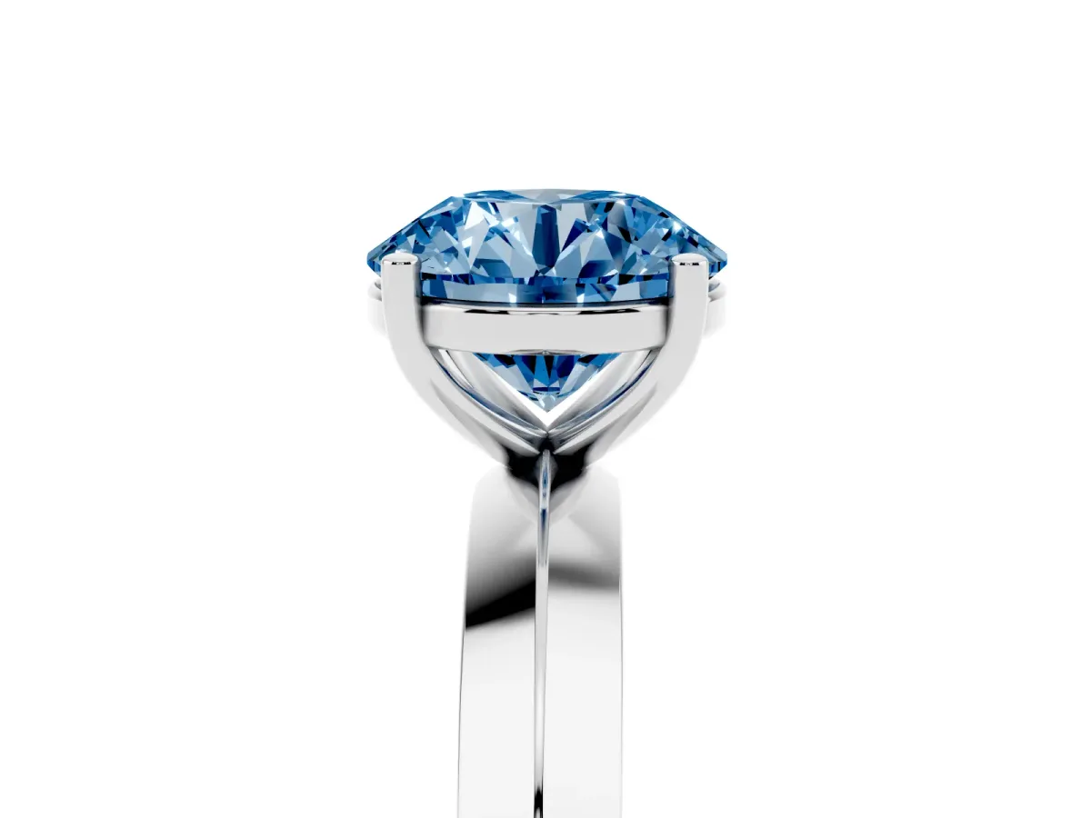 Fancy Blue Round Cut Cut Solitaire Engagement Ring with Flat Band and Four-Prong Setting Silver