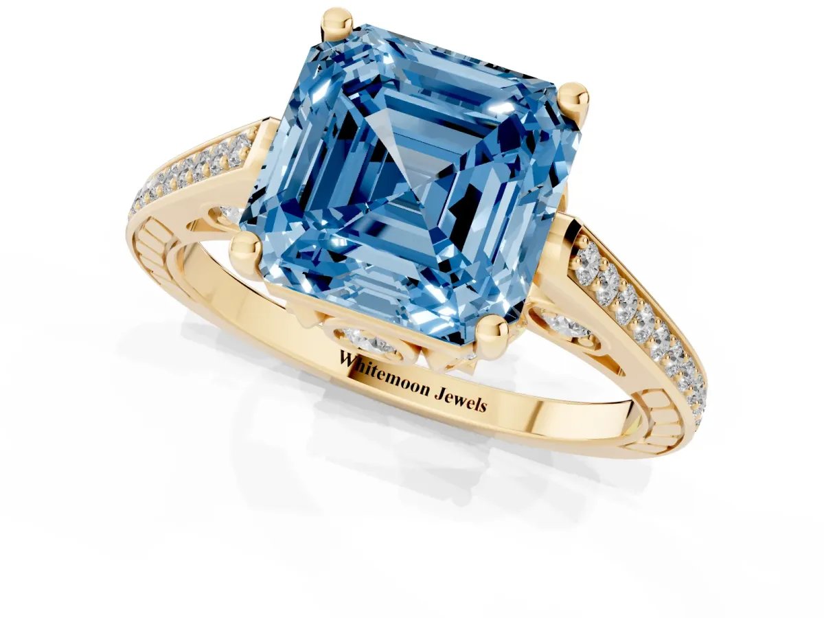 Fancy Blue Asscher Cut Cut Cathedral Pave Diamond Engagement Ring with Six-Prong Setting Yellow gold