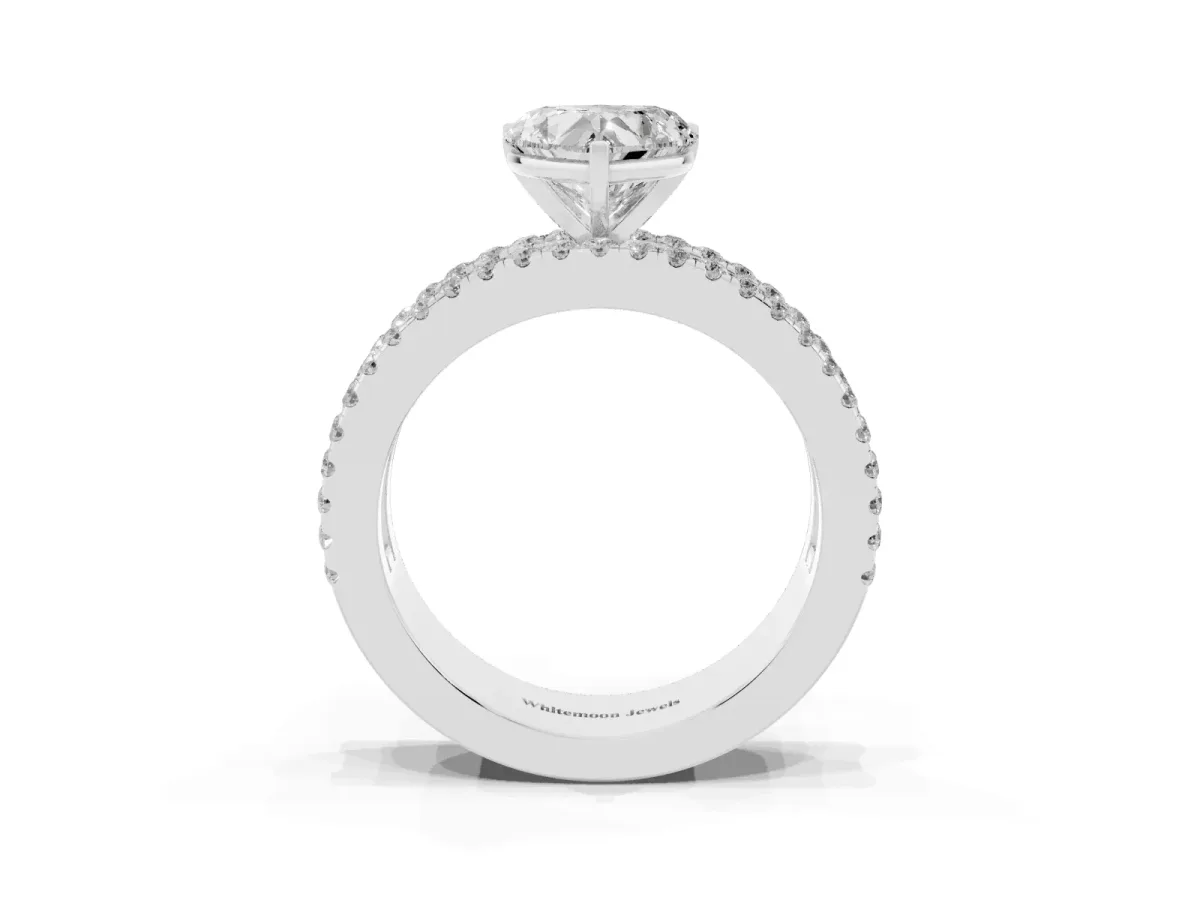 Heart Cut Diamond Solitaire Ring with Pavé and Channel Set Band Platinum